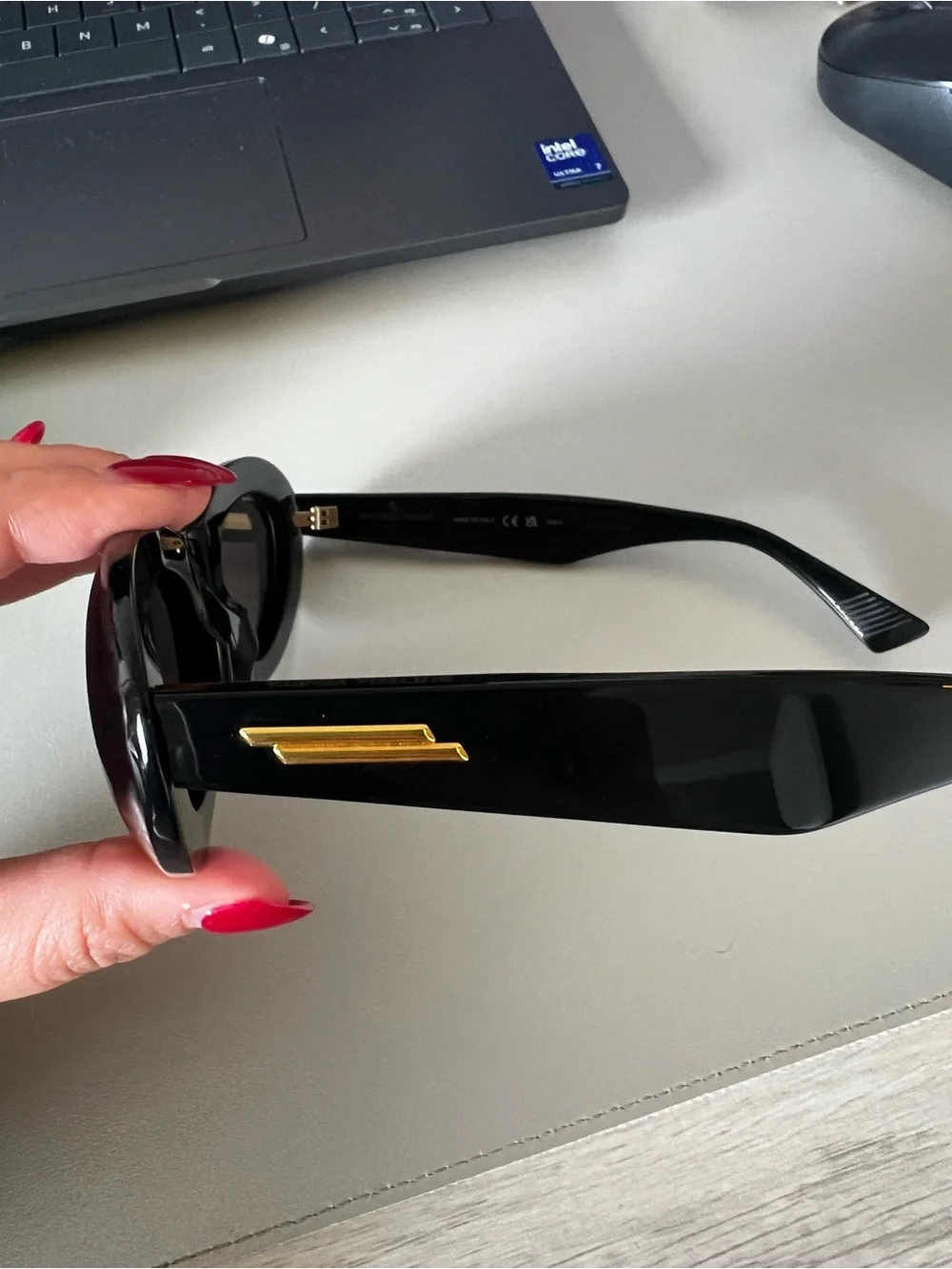 Bottega Veneta Black Oval Sunglasses with Dark Lenses